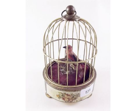 An automaton singing bird in a cage