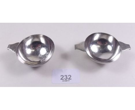 A Hamilton of Calcutta silver small two handled wine taster and similar single handled wine taster, marked silver and with el