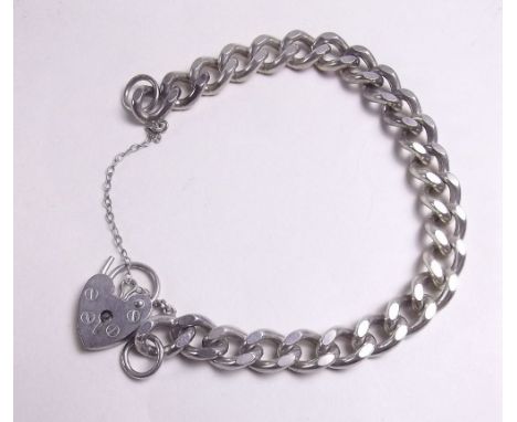 A silver curb chain bracelet - 27g