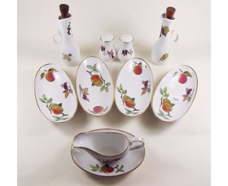 A Royal Worcester Evesham dinner service comprising seven plates, vegetable dish, four bowls, six napkin rings, oil and vineg