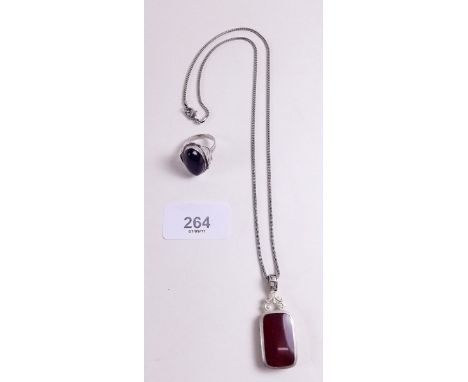 A silver and agate pendant and a silver ring