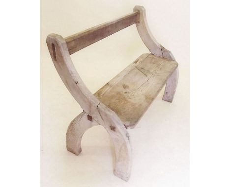 A handmade pine bench on curved end supports, 98.5cm long