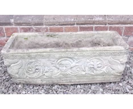 A stone finish garden trough