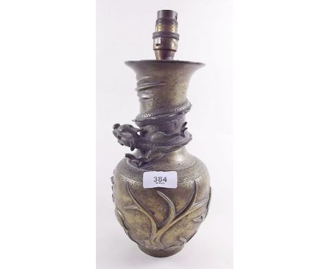 A Chinese brass vase decorated dragon, converted to a table lamp 31cms including fitment