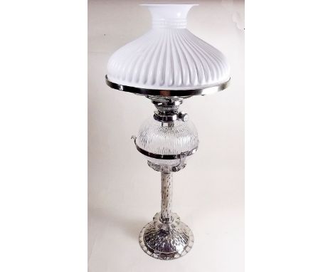 A cut glass and silver plated oil lamp with white reeded glass shade