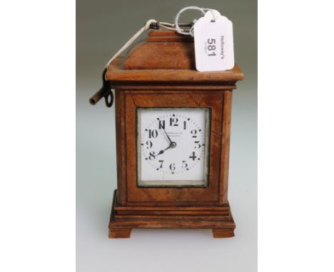 An early/mid 20th century mahogany cased Russells of Manchester miniature 8-day bracket clock, on shaped bracket feet, 18cm h
