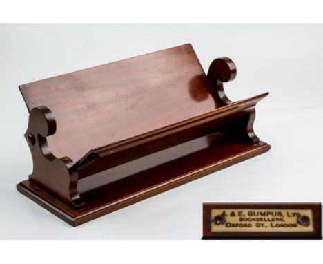 J and E Bumpus Ltd, Oxford St, London, an Edwardian mahogany book trough, bearing ivory retailer's label, 16 x 39 x 20cm