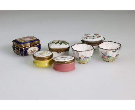 An early 20th century French enamel hinged lidded cashew box, with blue ground and reserves of flowers, together with a circu