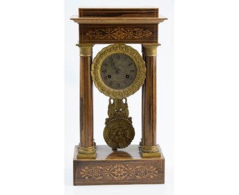 A 19th century French satinwood, rosewood inlaid 8-day portico clock, with ormolu mounts