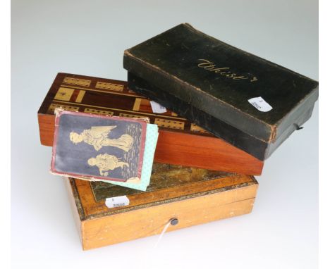 An early 20th century Continental trinket box, the hinged lid decorated with an Alpine scene enclosing four smaller lidded bo