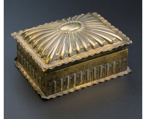 Charles Edwards, a silver gilt jewellery casket with gadrooned crimped hinged lid and sides, London 1889, a silver bun form c
