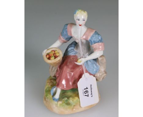 A Royal Worcester Pinder Davis figure of a lady with a basket of fruit