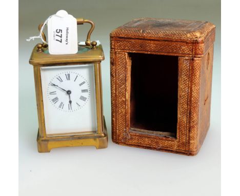 A c1900 corniche cased 9-day carriage timepiece, with white enamel dial, housed in a tooled morocco travel box, 11cm high