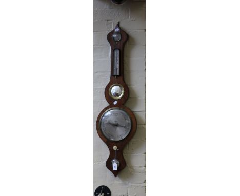 E Fontana, Gt Marlow, a mid 19th century rosewood wheel barometer, having damp/dry gauge, thermometer and mirror to neck over