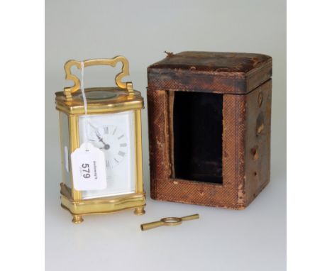A c1900 'cartouche' cased 8-day carriage timepiece, with white enamel dial, bearing the legend 'examined by John Barker, Lond