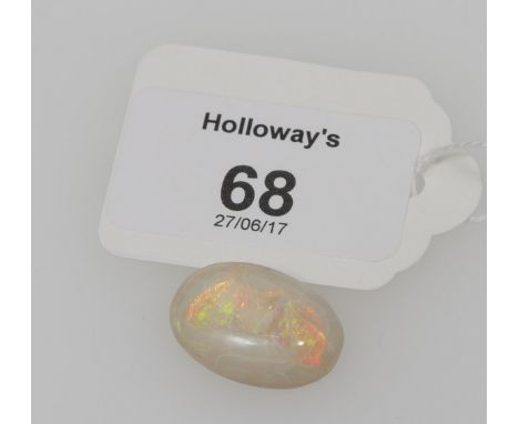 A single unmounted oval opal, of approximately 15 carats