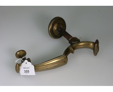 A large and impressive George II style scroll and urn door knocker, 24cm long