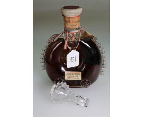 An unopened Baccarat decanter of Remy Martin & Co Grande Champagne Cognac Tres Vielle Age Inconnu, 21cm highBears label 'This