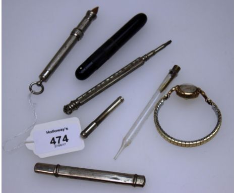 A white metal Johann Faber propelling pencil, with engine turned case, another unmarked propelling pencil, two plain sheath p