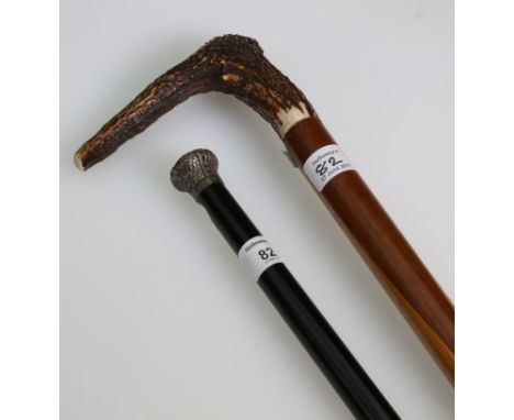 A 20th century silver pommel handled gentleman's evening cane, Birmingham 1978, 92cm long, together with a stoutly made antle