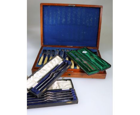 A mahogany cased set of twelve Edwardian ivory handled fish knives and forks, a cased pair of silver lobster picks, Sheffield