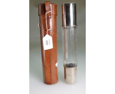 An early 20th century stitched leather cased hunting flask, of cylindrical form, fitted with a pair of white metal cups, 28cm