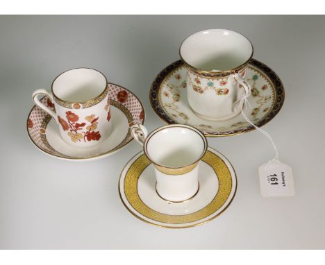 A George Jones (Crescent china), gilt swag decorated coffee can and saucer, together with other decorative coffee cans, tea c