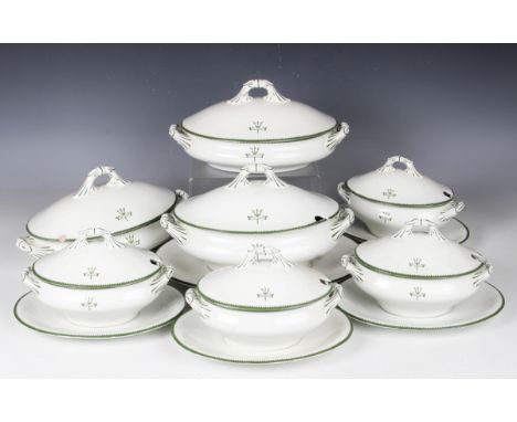 A Royal Worcester Vitreous part service, circa 1908, each piece printed in green with a trident crest crossed with a ribbon b