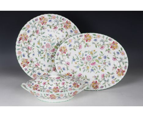 A Minton Haddon Hall pattern part service, comprising a large circular platter, diameter 38cm, an oval platter, stamped 'REJE