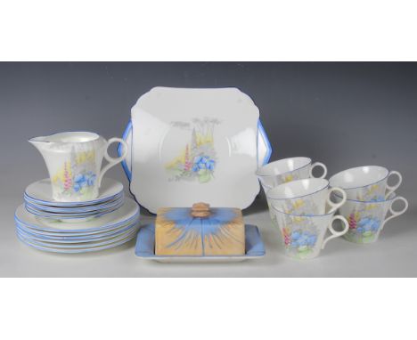 A Shelley Regent shape part service, pattern No. WR2169, comprising six teacups, saucers and tea plates, cake plate and jug, 