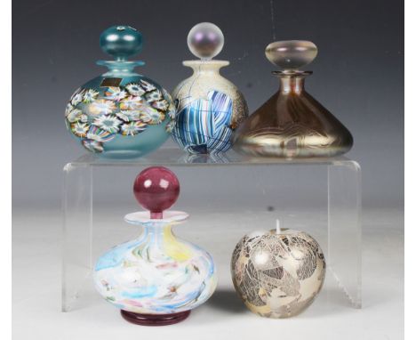 Four Isle of Wight glass perfume bottles and stoppers, comprising a Millefirico example, height 9cm, a White Ribbon example f