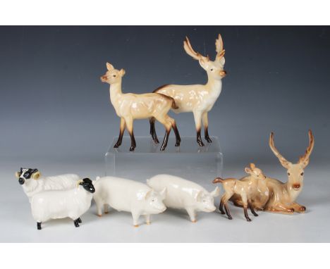 Twenty-one assorted Beswick animals, including a standing stag, No. 981, a lying stag, No. 954, a doe, No. 999A, a fawn, No. 