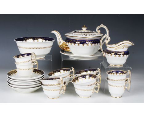 A Daniel porcelain part service, circa 1820-30, pattern No. 4073, comprising teapot, cover and stand, jug, slop bowl, eight t