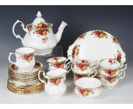 A Royal Albert Old Country Roses pattern part tea service, second quality, comprising teapot and cover, six teacups and sauce