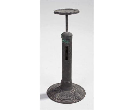 19th Century 'candle stick' letter scale, the disc top above a sprung scale and embossed base decorated with a steam engine, 