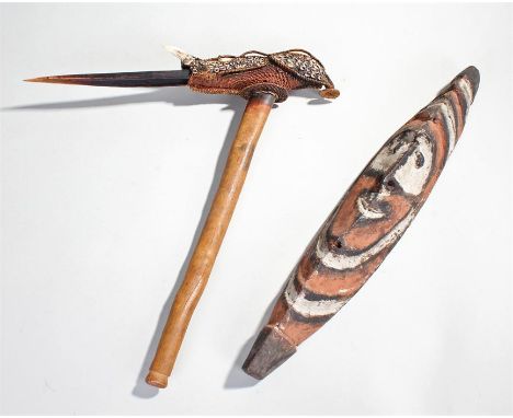 Papua New Guinea Sepik river mask and ceremonial axe, the mask of elongated form, the axe with a strung shell applied top, al