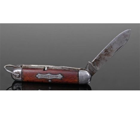 1930's Scout knife, the grip with an inset 'SCOUT KNIFE' plaque, with four folding blades/tools, 9cm long