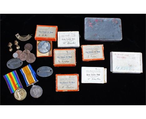 First World War Prisoner of War pair, to include War and Victory medals, (01172 PTE.W. HAWKES. A.O.C.) together with badges, 