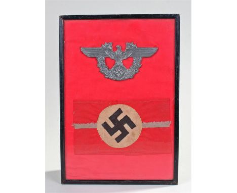 German Third Reich Police helmet shako plate, 15.5cm wide, together with a Nazi armband, (2)