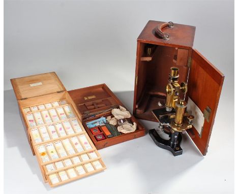 Bausch & Lomb brass and ebonised microscope, the microscope named Rochester, New York, Patented Aug 24. 97. housed within the