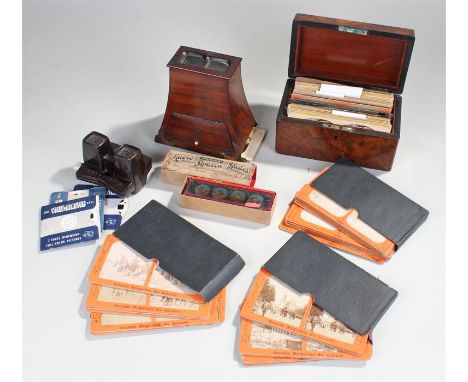 Victorian mahogany steroscopic viewer, of typical form and impressed "GR, Registd Set 15,1854" together with a walnut box fil