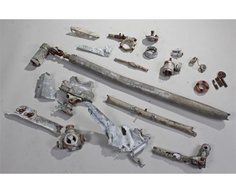 Relics of a Dornier D017 twin engine Bomber, to include the column shaft, flap hinge and other parts, the Dornier was shot do