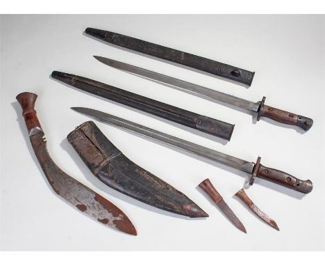 Two circa 1907 Sanderson bayonets, with arrow marks and dated 1907, both with scabbards, together with a kukri, (3)