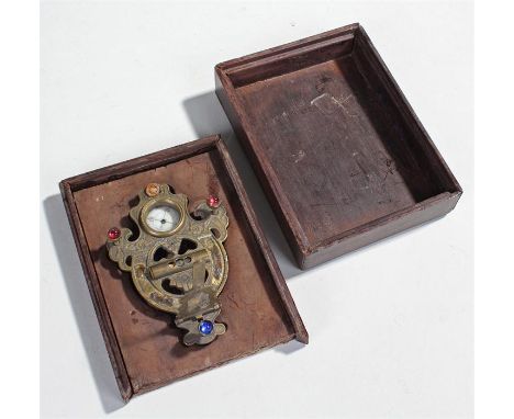 Chinese folding compass/sundial, standing on tripod feet, decorated with cabochon cut stones, 10cm long