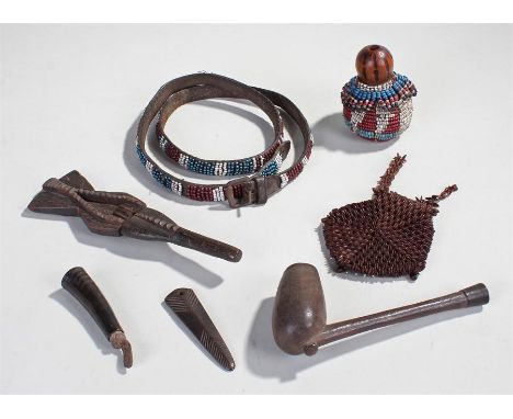 Collection of Southern African tribal items, to include a purse, a bead work flask, a crocodile knife, a pipe, a flask, a bel