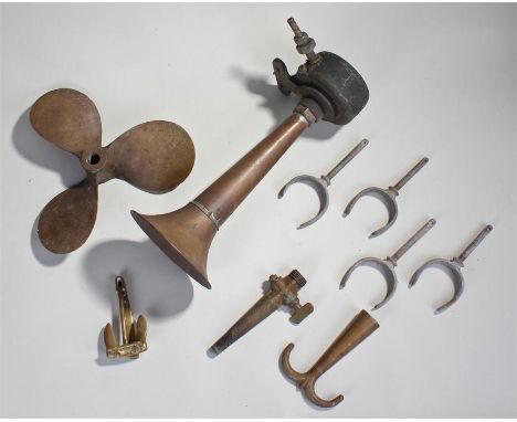 Collection of marine metalware items, to include a Klaxon foghorn, a brass propellor, a novelty anchor door knocker etc. (qty