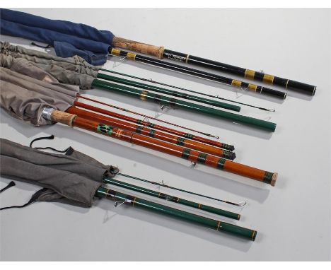 Four fishing rods, each split cane in cloth bags, together with a bow and arrow set, (qty)