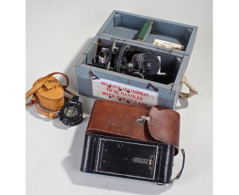 A.M. Astro compass, MK II, together with Stewart compass and a Kodak camera