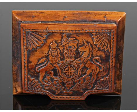 19th Century Royal Coat of Arms snuff box, the hinged carved lid depicting the Coat of Arms opening to reveal storage space, 