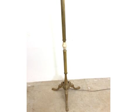 A gilt metal standard lamp with onyx divide and Britannia figurative legs.W:48cm x D:48cm x H:158cm